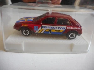 Mira Peugeot 205 in Red on 1:64 in Box - Bild 1 von 2
