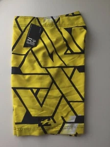 BILLABONG  MENS  YELLOW BOARD SHORTS SIZE 30 - Picture 1 of 3