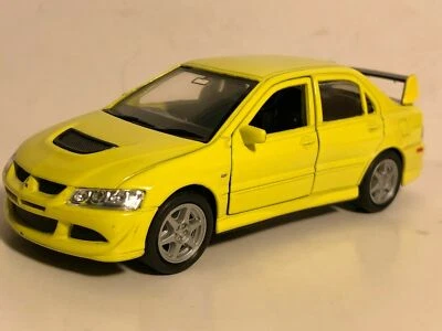 WELLY MITSUBISHI LANCER EVOLUTION XIII EVO 8 AMARILLO 1:32 TIRAR HACIA ATRÁS NUEVO SIN CAJA Foto 1 de 4