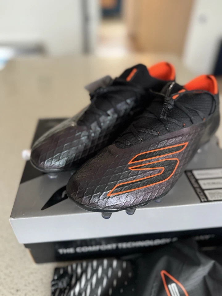 SKECHERS SKX_2 ELITE AG OBSIDIAN - PRETO/LARANJA - Imagem 1 de 4