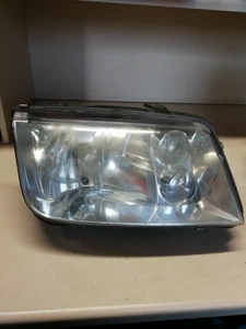 Frontscheinwerfer vorne rechts ohne Stellmotor 96359800 VW Bora  Schein 25 - Bild 1 von 8