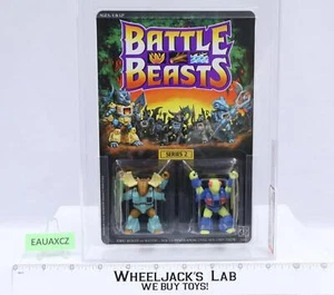 Delta Chameleon & Major Moose GRADO CAS 85 85/85/80 Battle Beasts NUEVO SELLADO - Imagen 1 de 5