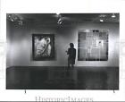 1991 Press Photo Alexandra Irvine admires photography at Houston Bluffer Gallery