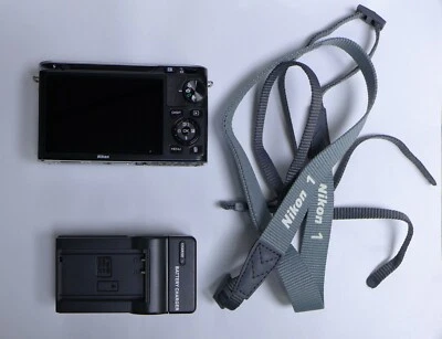 Nikon 1 J1 10.1MP Digital Mirrorless Camera- Silver, **Body & Charger** - Image 1 of 4