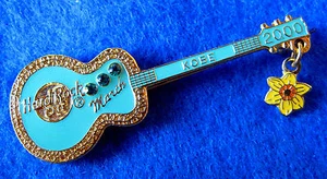 KOBE AQUARMARINE STONES & DAFFODIL FLOWER BIRTHSTONE GUITAR Hard Rock Cafe PIN - Picture 1 of 1