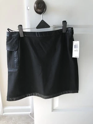 Falda corta negra International Concepts con detalles de imitación de cuero y bolsillo 6P Foto 1 de 4