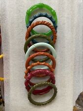 Pre Owned Molded Lucite Bakelite Plastic Set Of 9 Carved  Bangle Bracelets.