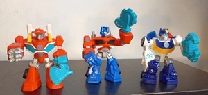 3 Hasbro Transformers Rescue Bots Actionfiguren - Optimus Prime, Firebot - Bild 1 von 2