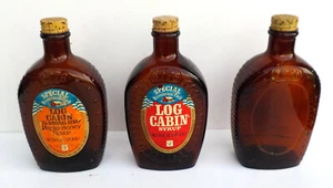 JUEGO DE TRES (3) CABAÑAS DE TRONCOS 24 OZ. BOTELLAS DE JARABE BICENTENARIO COLECCIONABLES - Imagen 1 de 3