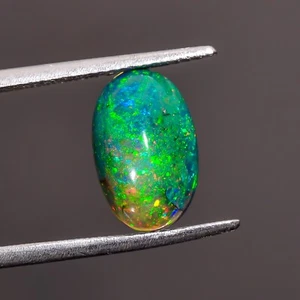 2.1 Ct Pinfire Black Ethiopian Fire Play Opal Oval Cabochon Gemstone 11X7X4 mm - Picture 1 of 3