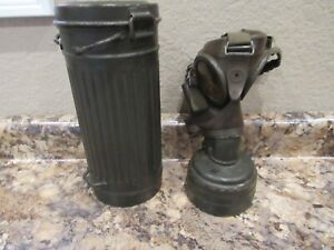 WWII German Army gas mask tin with mask, filter and one strap