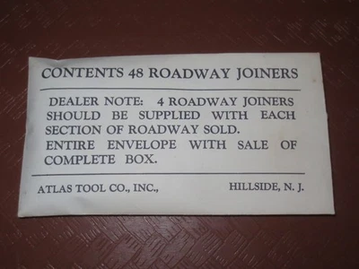 48 PCS ATLAS HO SLOT CAR TRACK CLIPS ROADWAY JOINERS IN BRASS IN RARE ATLAS PKG. Foto 1 de 2