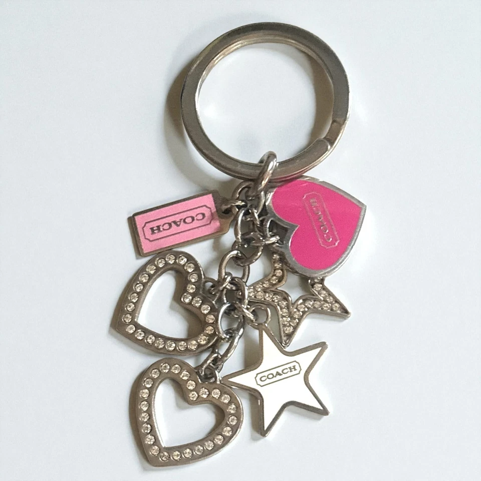 Llavero Coach con Corazón y Estrellas Bolso Dije Plata Estrás Corazones Rosa Etiquetas Foto 1 de 3