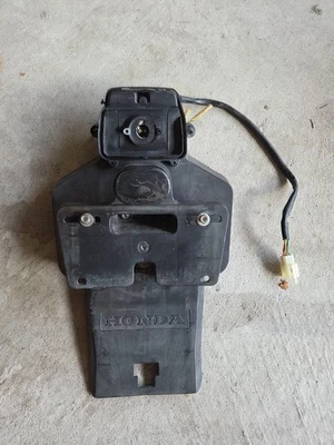 Titular de matrícula nx650 nx 650 original OEM Stanley 040-0094 Foto 1 de 3