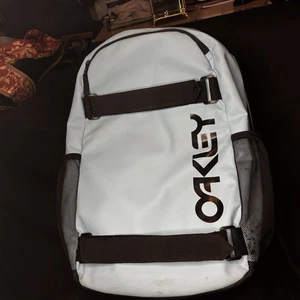 Mochila de viaje Oakley para hombre al aire libre azul/negro duradera bolsillos de malla limpia - Imagen 1 de 4