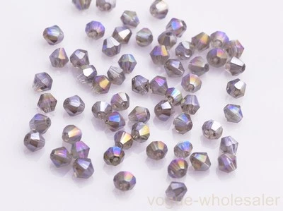 Venta al por mayor 500 cuentas espaciadoras sueltas bipirámide facetadas de vidrio de cristal bicono de 4 mm Foto 1 de 4