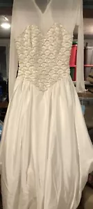 Abito da sposa perline e paillettes a maniche lunghe trasparente con treno taglia 10 - Foto 1 di 23