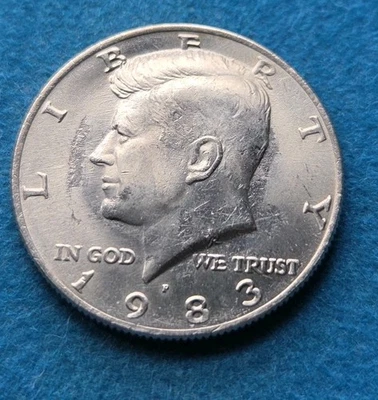 1983-P Kennedy Half Dollar “No FG” Error – Grease Filled Die-S - Image 1 of 4