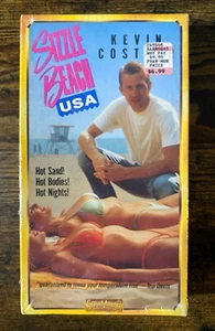 VHS: Sizzle Beach USA (1981): Kevin Costner - Picture 1 of 1