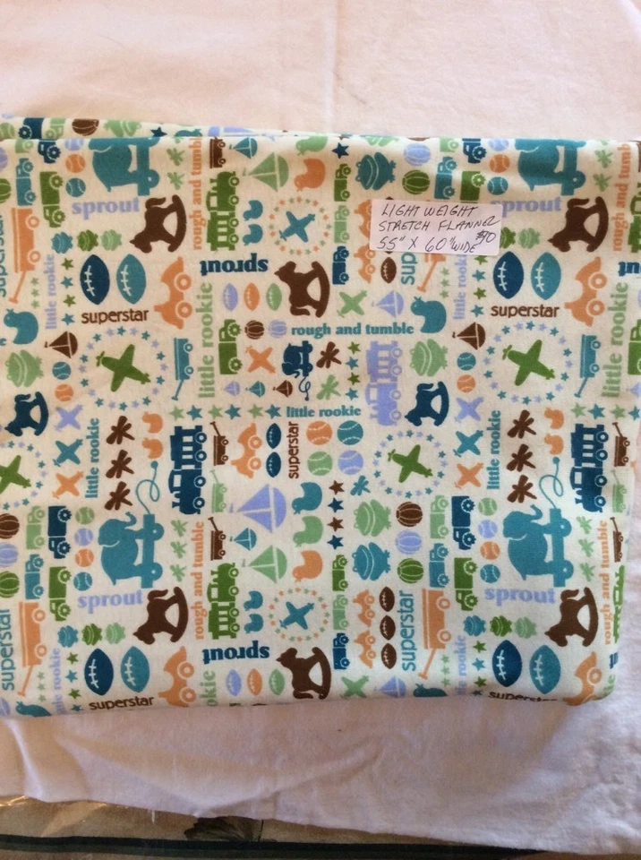 Yellow With Sports, Trains, soft cozy  Flannel Nursery Fabric 55" By 60" Wide - Image 1 of 1