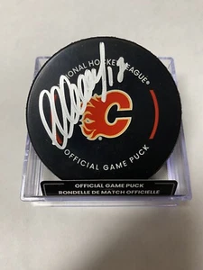 SIGNED AUTOGRAPHED OFFICIAL NHL GAME PUCK CALGARY FLAMES YEGOR SHARANGOVICH - Picture 1 of 2