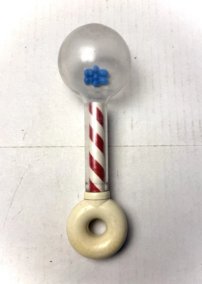 Revista para padres de juguete de bebé a rayas rojas y blancas Johnson de colección Johnson & Johnson años 70 Foto 1 de 4