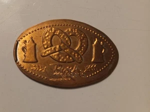 Buschgärten Bier und Brezel länglicher Pfennig - Bild 1 von 1