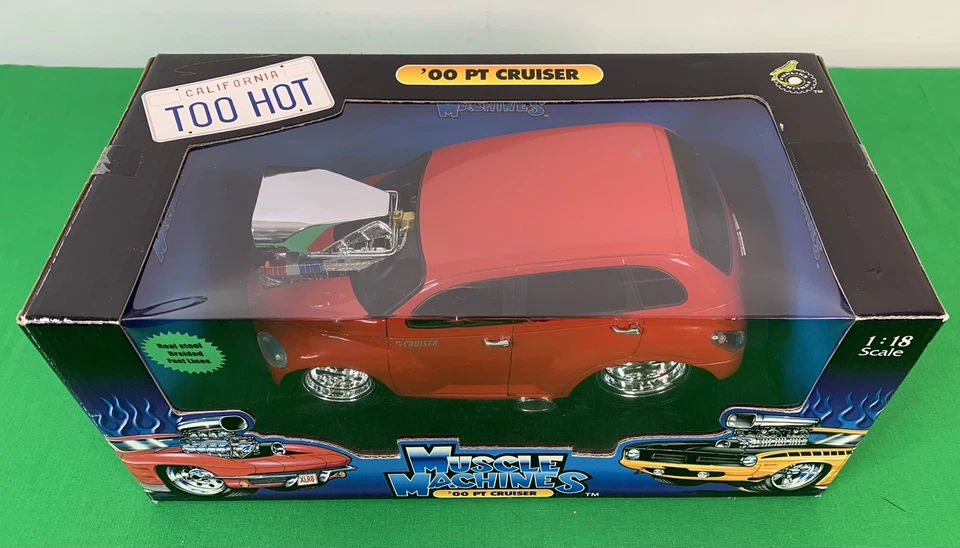 Die Cast MUSCLE MACHINES 00 PT CRUISER IN RED 1/18 SCALE NIB - Image 1 of 4