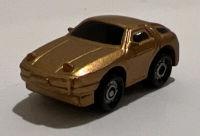 Vehículo deportivo vintage Micro Action Porsche 928 1 1/4" dorado Funrise 1989  Foto 1 de 4