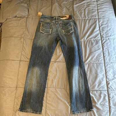 Pantalones de mezclilla Ariat® para hombre M5 tiro bajo jugador calce ajustado pierna recta 10012703 talla 34x36 Foto 1 de 4