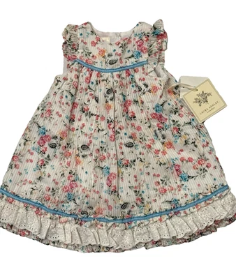 全新带标签 Laura Ashley 婴儿尺寸 12 个月花卉连衣裙 100% 棉荷叶边下摆 — 第 1/4 张图片