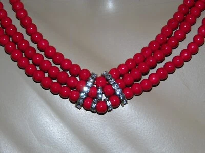 THREE STRAND GENUINE RED HOWLITE AND AUSTRIAN CRYSTAL BEADED NECKLACE   270 CTW - Image 1 of 4
