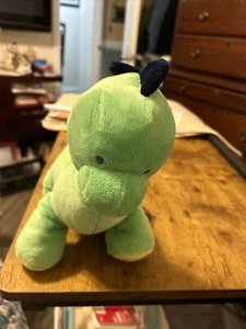 Peluche dinosauro chiavi in mano musicale verde - Foto 1 di 8
