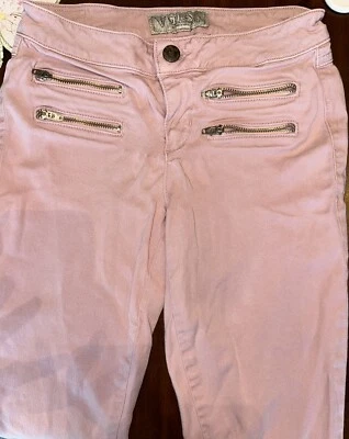 Pantalones ajustados Guess rosa talla 26 con cremalleras para las piernas textura encerada rosa Foto 1 de 3