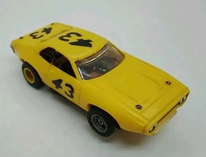 Aurora AFX Plymouth Road Runner Stock Car mit beleuchtetem Chassis HO Scale Slotcar - Bild 1 von 12
