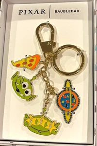 TOY STORY PIZZA PLANET alien Bag Keychain CHARM DISNEY x BAUBLEBAR nib - Picture 1 of 1