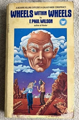 WHEELS WITHIN WHEELS by F. Paul Wilson (1ST DELL PRINTING - 1979) PB - Image 1 of 4