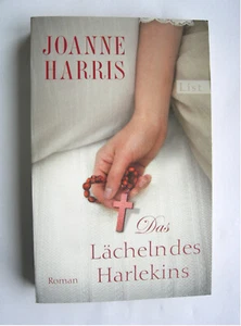 Das Lächeln des Harlekins von Joanne Harris Taschenbuch Roman  - Bild 1 von 3