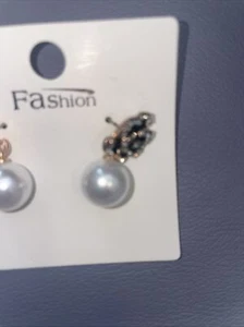 ohrstecker. Blume mit Perle - Bild 1 von 2