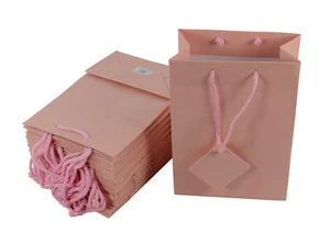 Sacchetti regalo con coulisse rosa opaco con etichette per negozio, bomboniere matrimonio (12x17 cm) - Foto 1 di 7