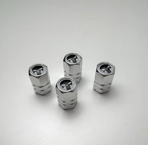 JUEGO DE 4 TAPONES ANTIPOLVO VÁLVULA NEUMÁTICO - CALAVERA CASTIGADORA - PLATA / BLANCO / NEGRO - Imagen 1 de 5