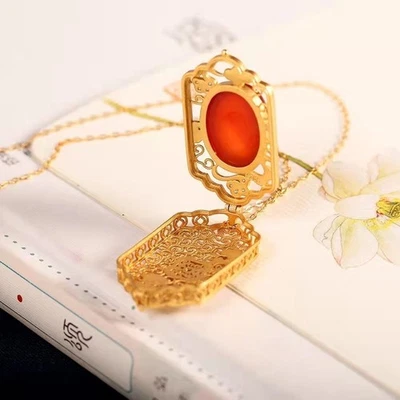 Handmade Inlaid Ice Red Agate Sachet Gau Box Hollow Pendant Necklace for Women Foto 1 de 4