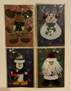Juego de 4 tarjetas en blanco de vacaciones de Navidad con sobres muñecos muñeco de nieve pingüino alce - Imagen 1 de 8