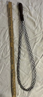 ANTIQUE METAL RUG BEATER WITH RARE METAL HANDLE - Image 1 of 2