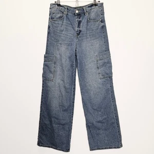 Pantalones de mezclilla de tiro alto con bolsillo de carga medio trasero flexible pierna ancha azul renacimiento talla 30 - Imagen 1 de 10