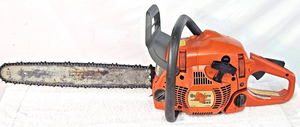 Husqvarna 445 Chainsaw runs well see video watch it run Read Description - Image 1 of 4