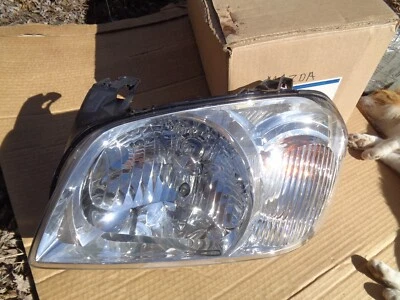 2001 02 2003 2004 MAZDA TRIBUTE FARO LH lado del conductor OEM 5T2Z-13008-CB nuevo Foto 1 de 4