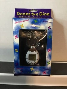 Dooba The Dino Virtual Pet.. Anhänger Version.. Nagelneu - Bild 1 von 13