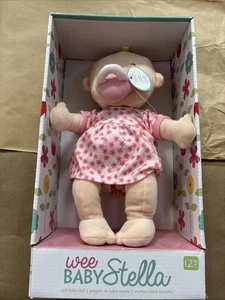 Wee Baby Stella weiche pfirsichfarbene Plüschpuppe 12 Zoll Blumenkleid The Manhattan Toy Company - Bild 1 von 8
