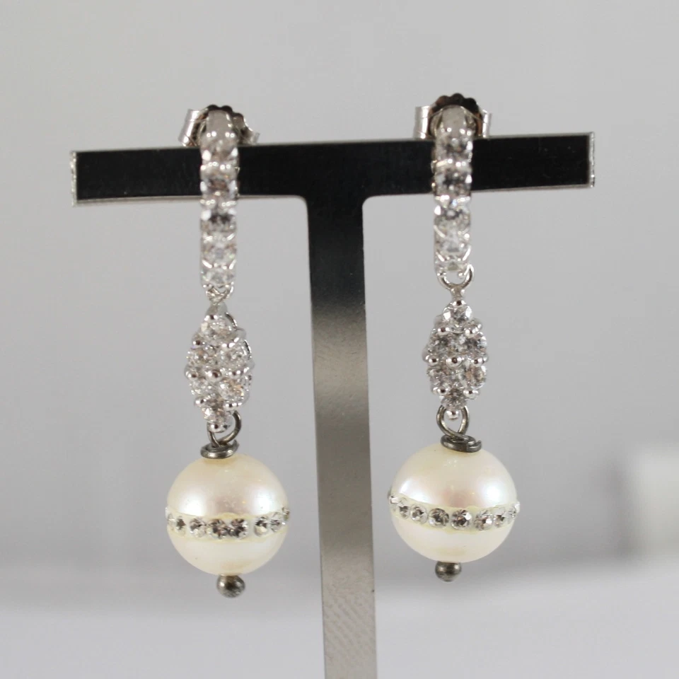 ORECCHINI IN ARGENTO 925 CON ZIRCONI E PERLA BIANCA CON GIRO PIETRE ALL' ESTERNO - Immagine 1 di 1